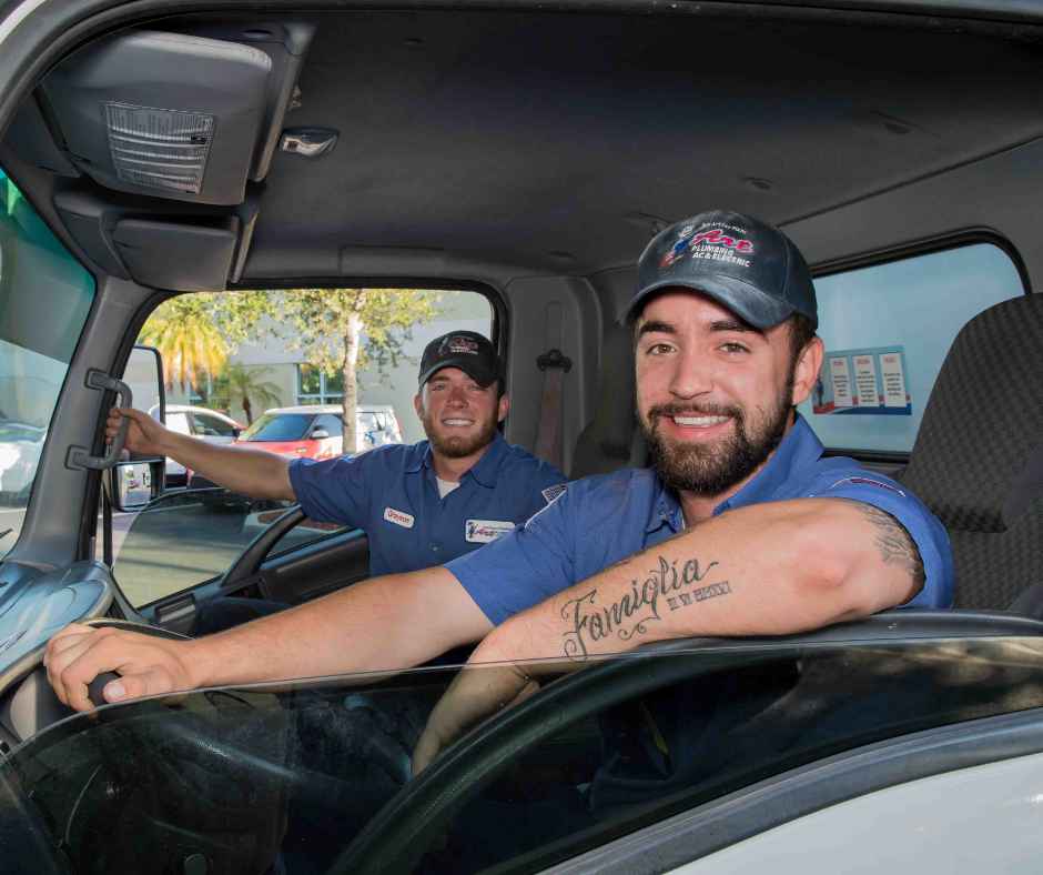 Art Plumbing, Air Conditioning & Electric technicians in their vehicle